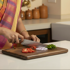 Wooden cutting board on a beige background