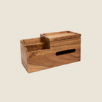 Wooden storage box with lid on a beige background